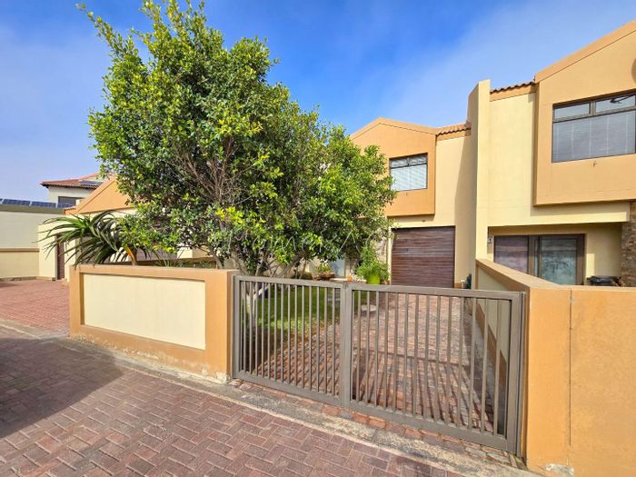 Dolphin Beach Townhouse For Sale: 3 Bedrooms, pet-friendly, sea views, private garden.
