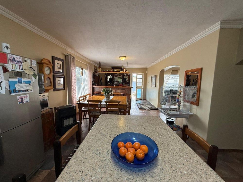 Open-plan kitchen, lounge and dining room