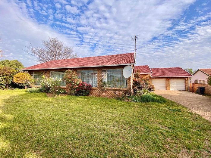 For Sale: Spacious 4-bedroom house in Roodekrans with double garage and outdoor area.