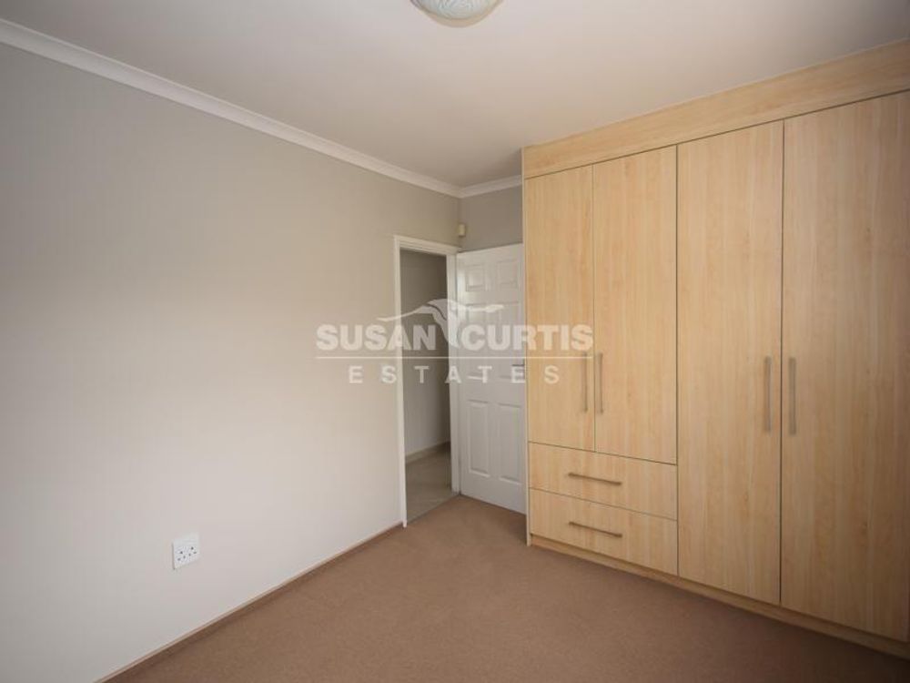 3rd bedroom with built in cupboard