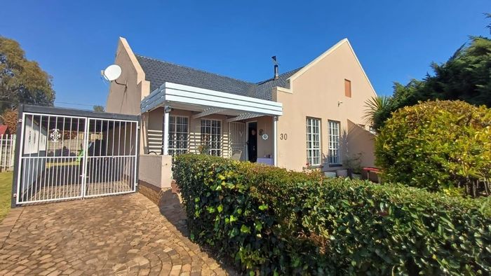 2-Bedroom Townhouse in Albertsdal For Sale with private garden and secure parking.