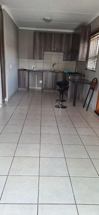 For Sale: 2-Bedroom Townhouse in Brakpan North with Open Plan Living and Carport.