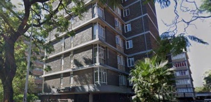 Unique 1-bedroom apartment in Sunnyside with home office space, for sale.