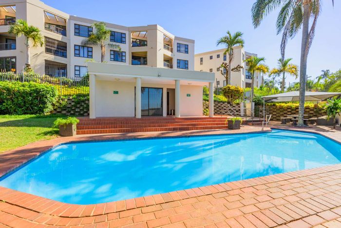 For Sale: Apartment in Umhlanga Central with pool, security, and beach access.