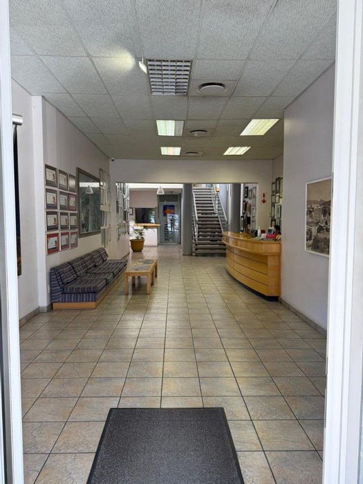 For Sale: Office in Windhoek Central with multiple offices, retail tenants, and security.