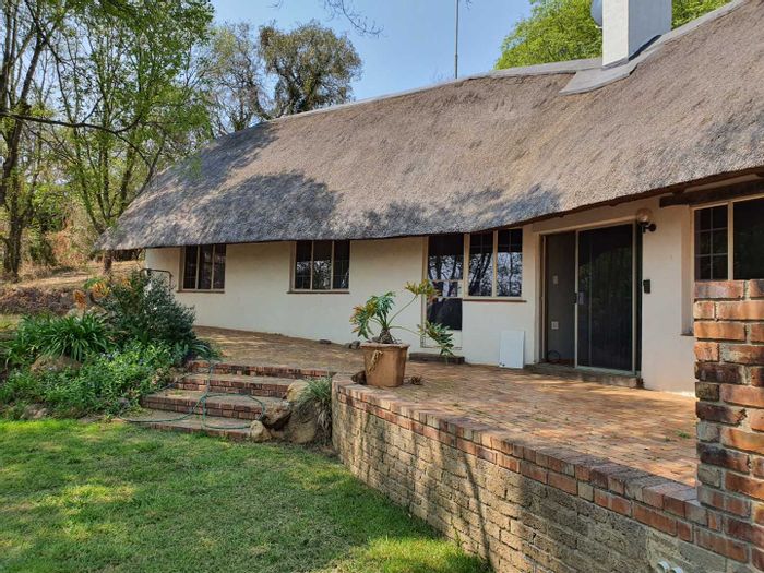 House To Rent in Rietfontein AH: 3 Bedrooms, communal pool, private garden, fireplace.