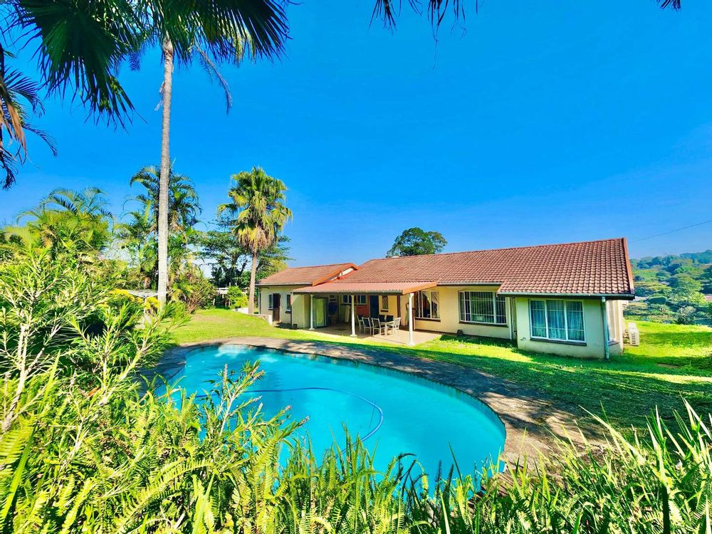 Entertainment side of the home overlooking the garden and pool.