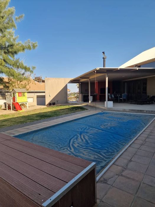 Stunning House for Sale in Auasblick with Pool, Apartments, and Smart Home Features.