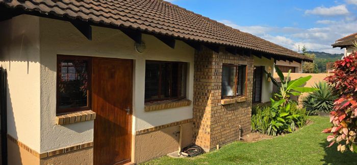 For Sale: Townhouse in Stonehenge with private patio, garage, and secure access.