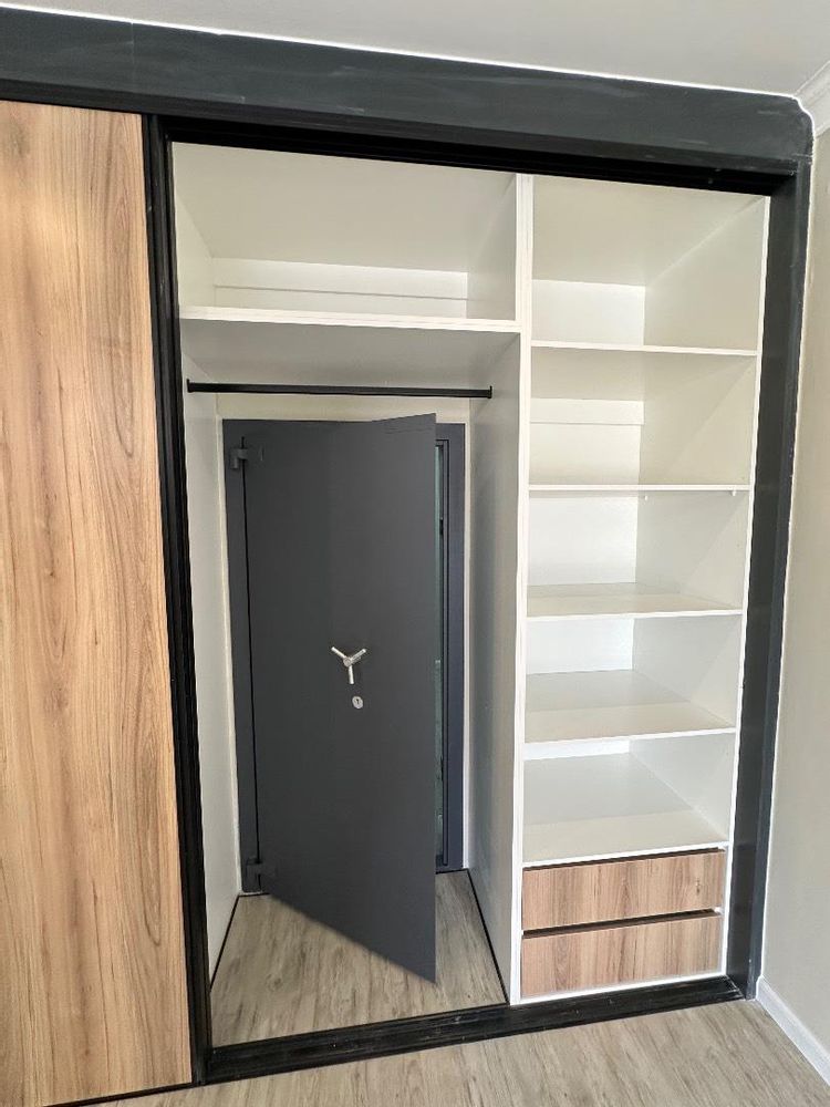 Walk in safe in main bedroom