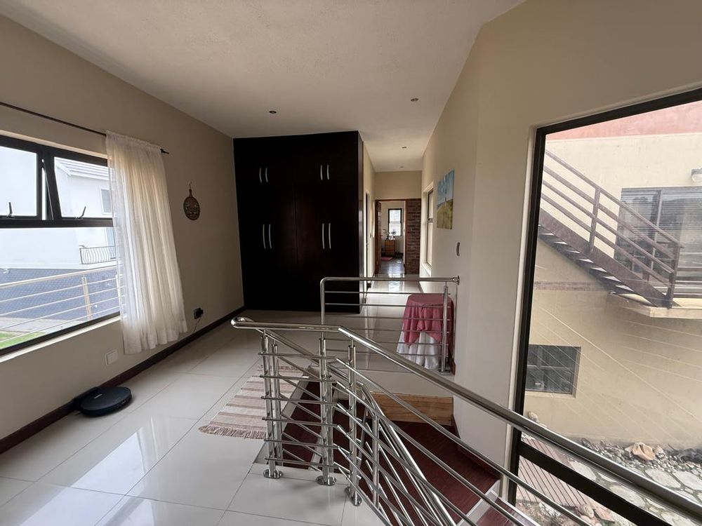 Hallway with BIC that leads to the study and bedrooms