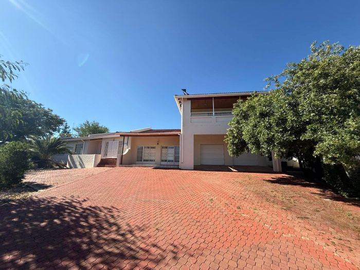 Spacious Olympia house with flatlet, pool, and ample living space for sale.