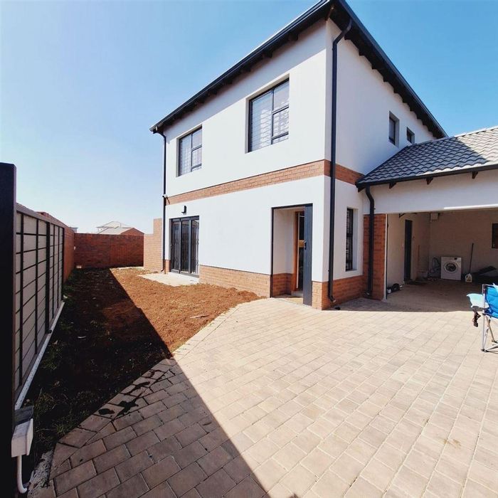 For Sale: Cluster in Parkhaven with garden, garage, security features, and braai area.