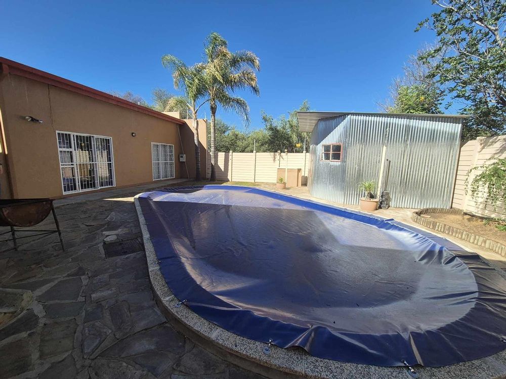 Swimming pool in front of two bedroom apartment