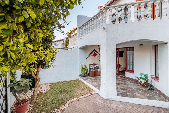 For Sale: Townhouse in Greenshields Park with pool, patio, and garage.
