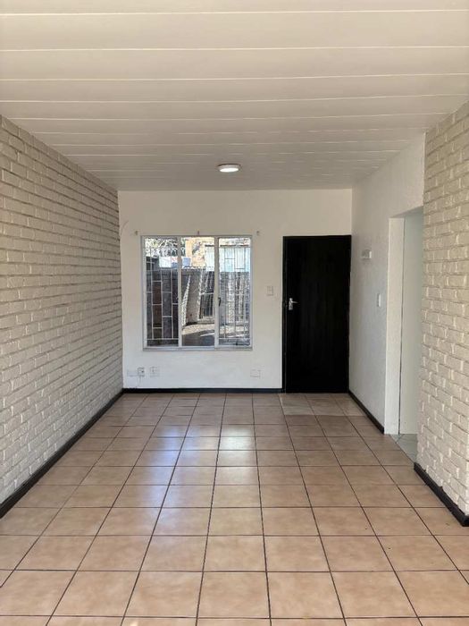 For Sale: 2-bedroom townhouse in Pretoria North with undercover parking and investment potential.