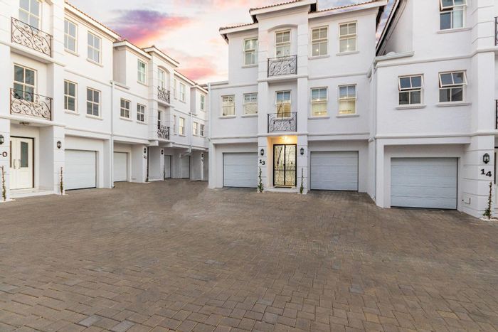 Stunning Bryanston Townhouse for Sale: Features Pool, Garden, and Secure Living.