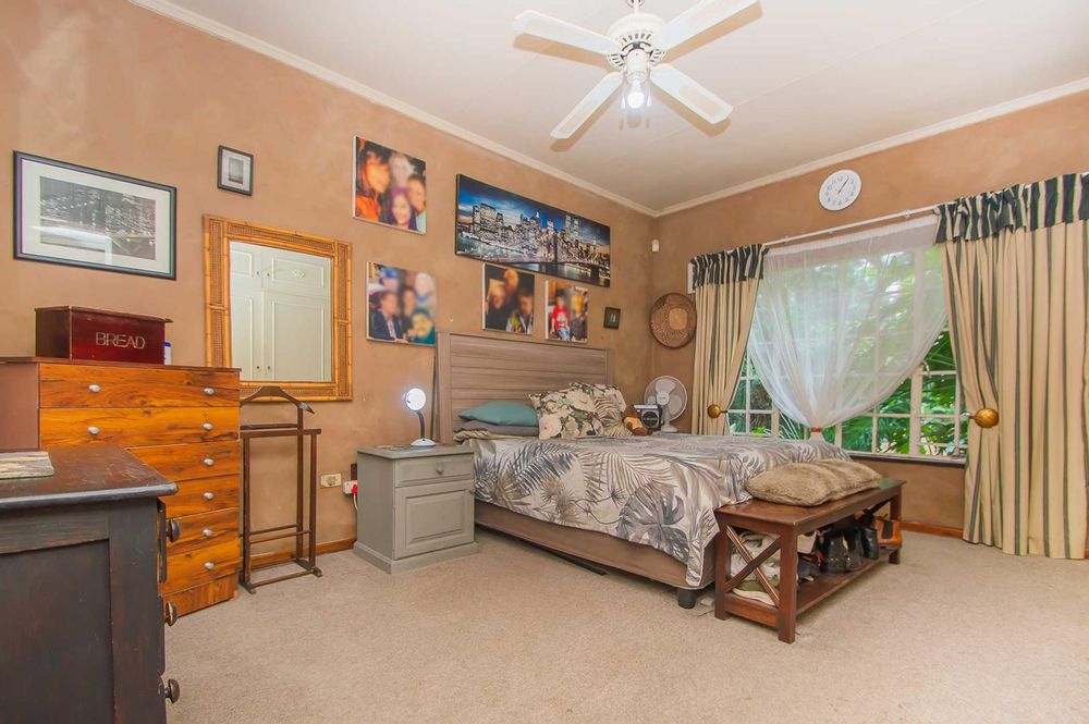 Main bedroom is extra spacious with views over pool