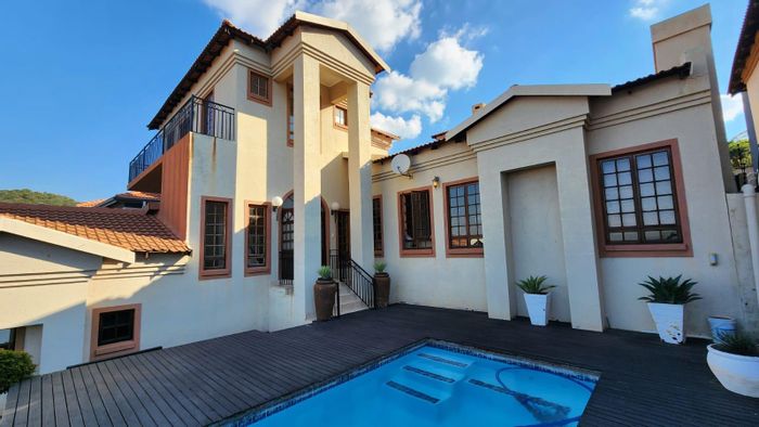 For Sale: Spacious 4-bedroom house in Cashan with entertainment areas and double garages.