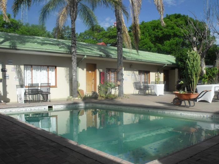 For Sale: Guest House in Grootfontein Central with restaurant, pool, and parking.