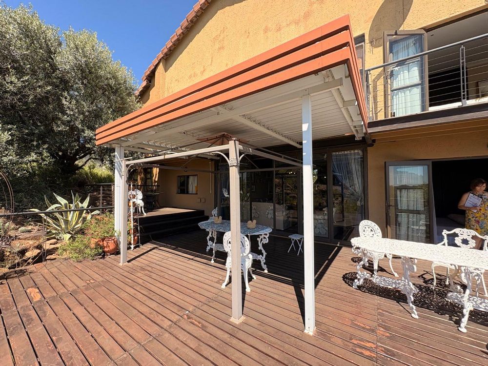 Outside balcony and covered patio area.