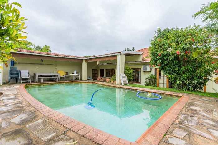 Versatile Durban North Central house with large outbuildings, pool, and office space. For Sale.