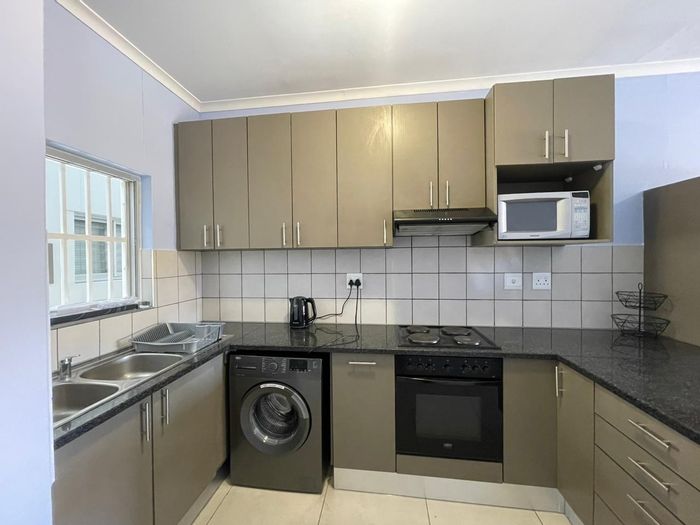 Klein Windhoek House To Rent: 2 bedrooms, balcony, basement parking, available immediately.