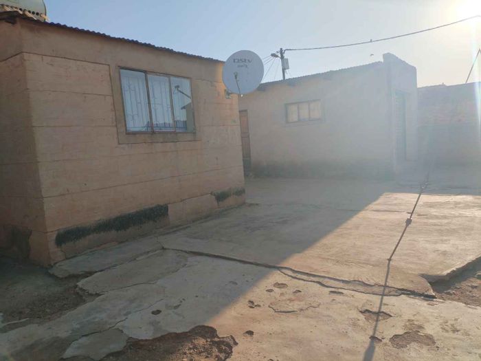 Nellmapius House For Sale: RDP with 3 outside rooms, large yard, and toilet.