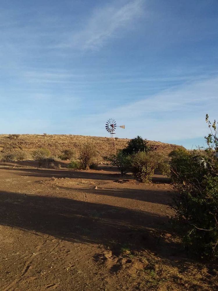 Wind pump location with a hilltop in the background