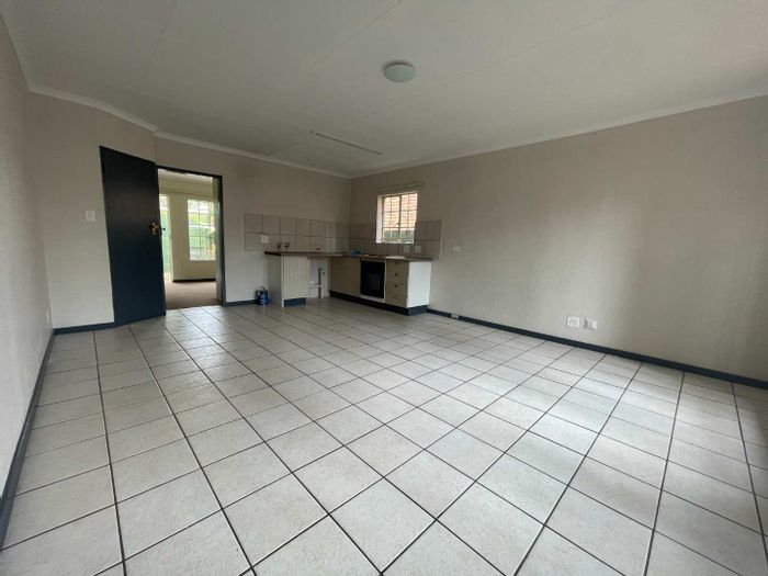 1-Bedroom Apartment To Rent in Rietfontein with gardens and covered carport.