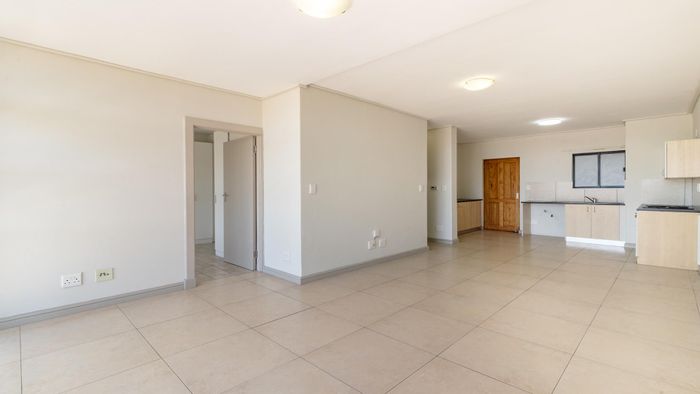 For Sale: Apartment in Milnerton Ridge with 2 beds, balcony, and pre-paid utilities.