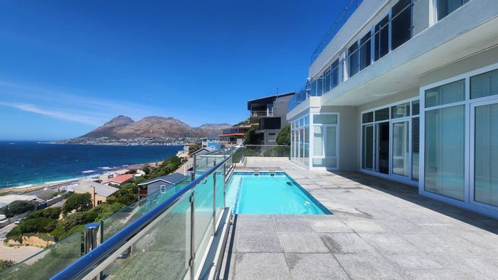 Cairnside House For Sale: Four-story residence with ocean views, pool, and garages.