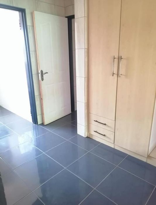 Three-bedroom house to rent in Soshanguve Central with fitted kitchen and carport.
