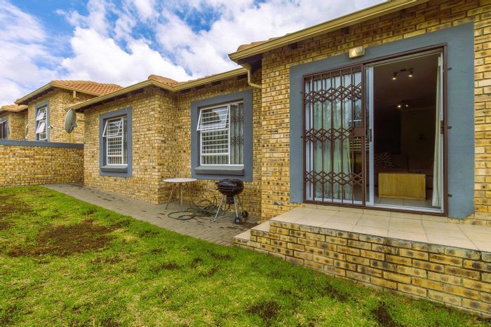 For Sale: Townhouse in Wilgeheuwel with 3 beds, garage, and garden access.