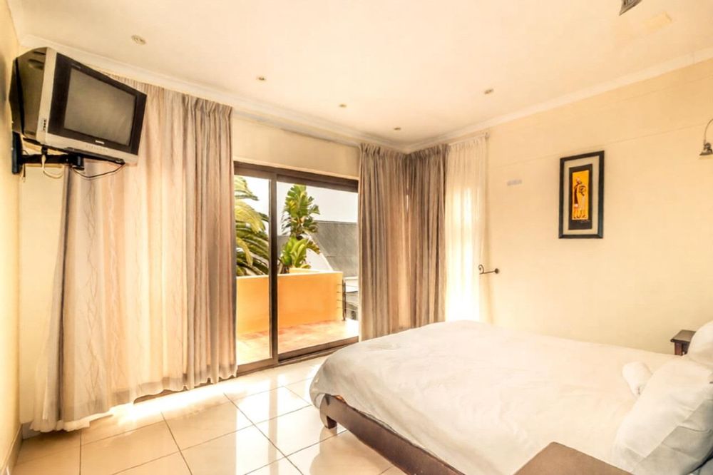 one of the bedrooms of the flat