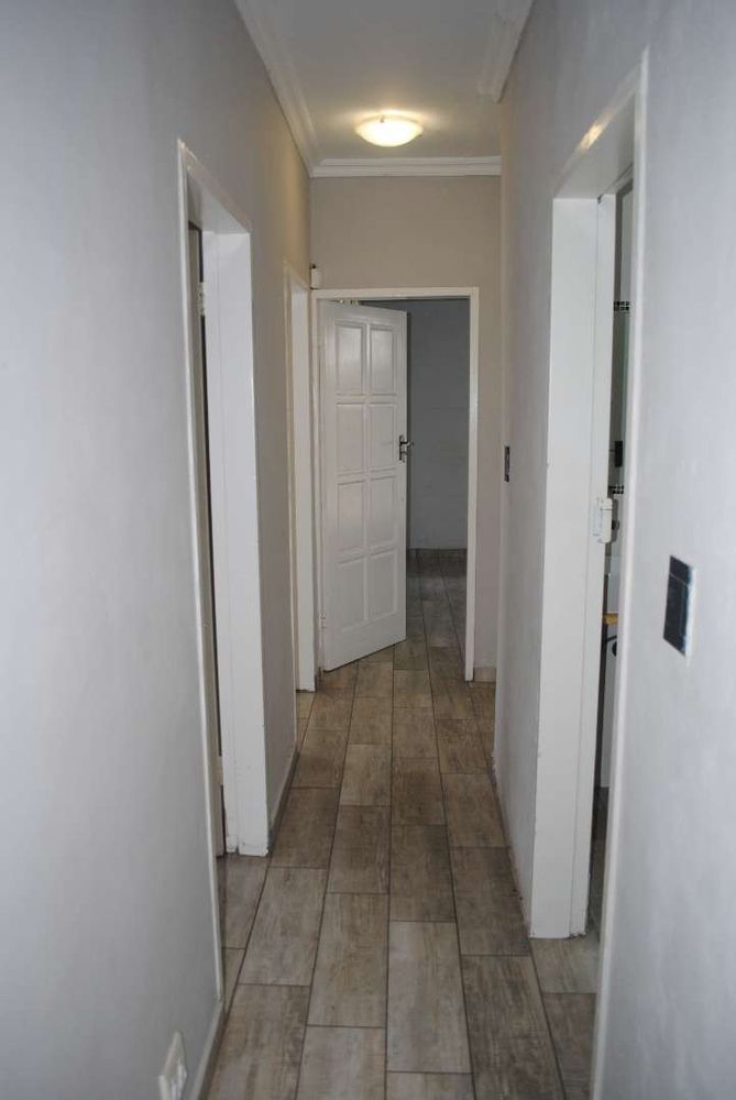 Passage to 2nd bathroom and 3 Bedrooms