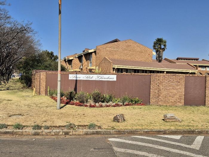 For Sale: 3-bedroom apartment in Parkrand with private garden and communal pool.