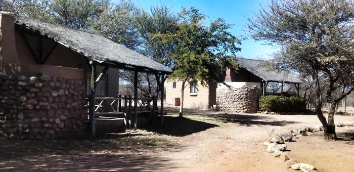 Okahandja Central Small Holding For Sale: Diverse infrastructure, guest accommodations, and expansive land.