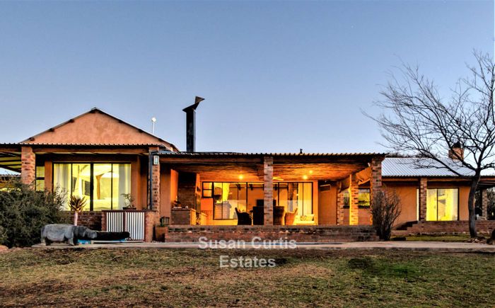 House for Sale in Windhoek Central: Private game estate, multiple residences, pool, and amenities.