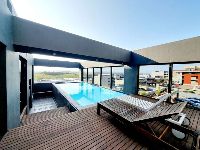 For Sale: Apartment in Umhlanga Ridge with pool, gym, and secure storage.