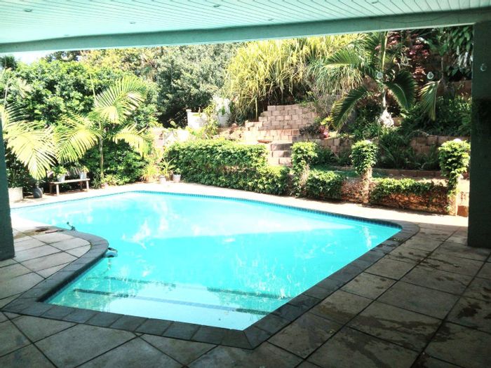 La Lucia House For Sale: Spacious lounges, pool, garden, and security features.