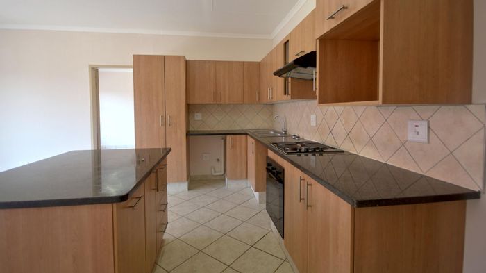1-Bedroom Apartment To Rent in Elarduspark with covered carport and 24-hour security.