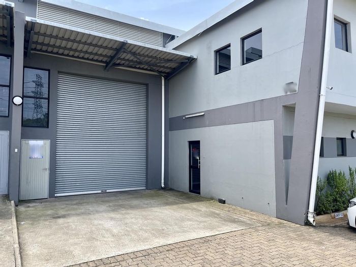 Industrial unit in Cornubia Central to rent, featuring container access and office space.