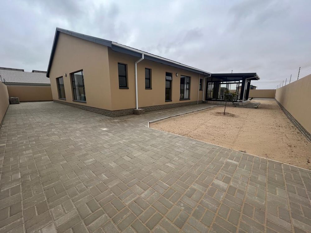 Back courtyard with enclosed patio