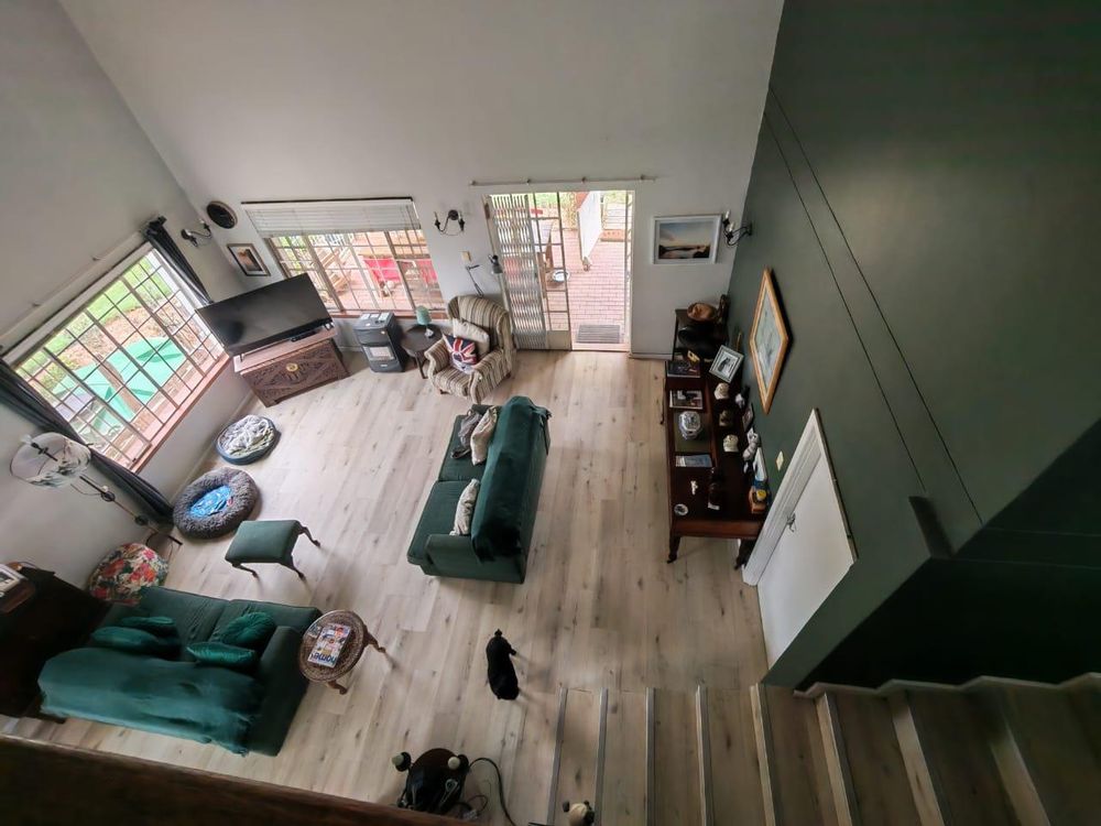 view from top landing next to the office or workspace over front and lounge area 