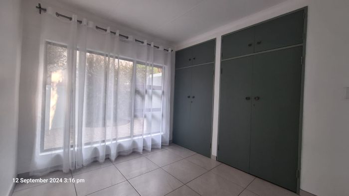 Renovated Atlasville apartment with open plan kitchen, study, and built-in braai. To Rent.