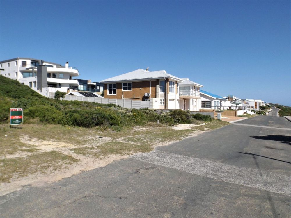 Our Plot on our left; up-market Houses on the Gansbaai side.