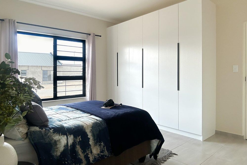 Main bedroom with plenty of cupboards and ensuite bathroom.