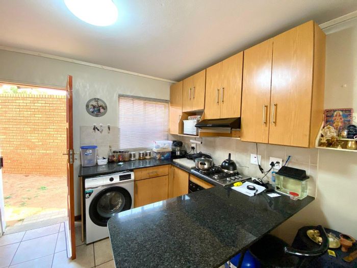 For Sale: Townhouse in The Reeds with pool, clubhouse, and pet-friendly features.