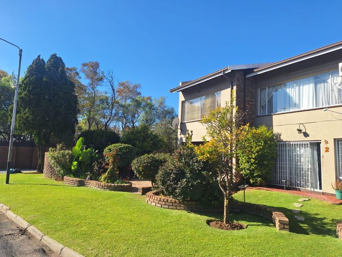 For Sale: 2-Bedroom Townhouse in New Redruth with security, gardens, and convenience.